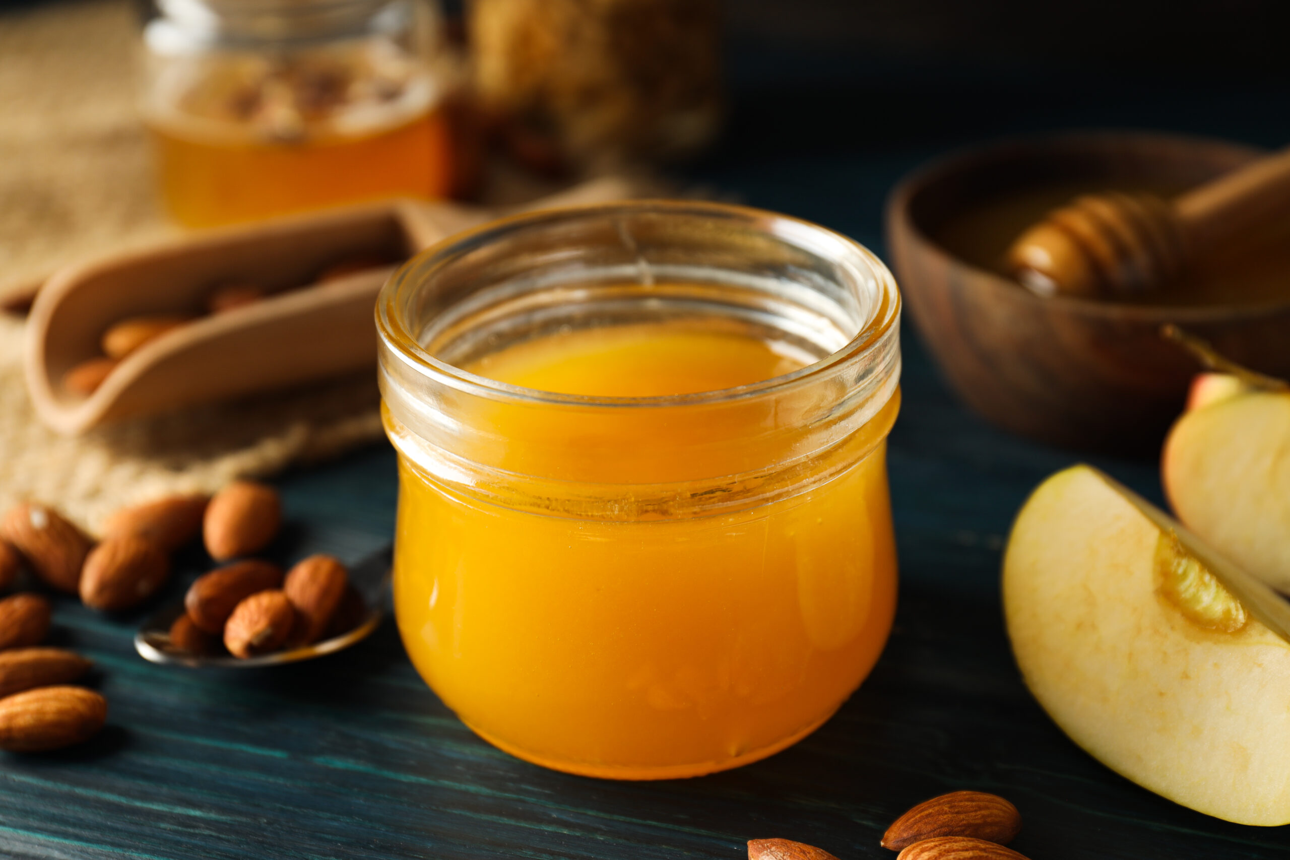 Concept of tasty and sweet food - honey with nuts