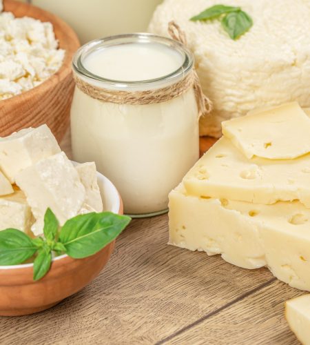 Assortment of fresh dairy products, Bottle milk, cheeses, cottage cheese eggs yogurt, butter. Organic food,