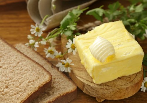 organic dairy product butter on wooden background